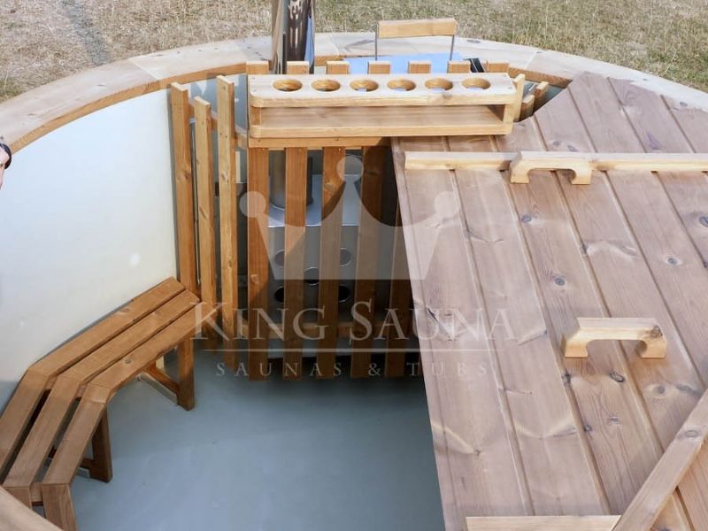 Bain nordique Thermowood avec coque en plastique pour 6 personnes Bain nordique Thermowood avec coque en plastique pour 6 personnes